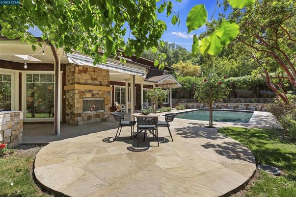 Exterior, Fireplace, Pool