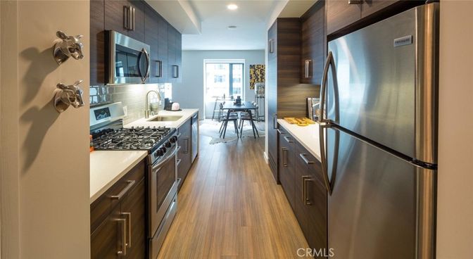 Dining room, Interior, Kitchen, Recessed Lighting, Stainless Steel Appliances, Wood Texture Flooring
