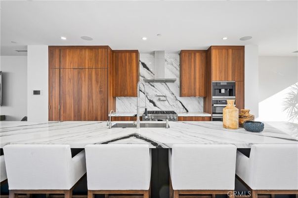 Interior, Kitchen, Marble Walls, Recessed Lighting, Stainless Steel Appliances