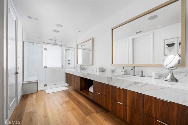 Bathroom, Dual Sink Vanities, Glass Shower, Interior, Recessed Lighting, Wood Texture Flooring