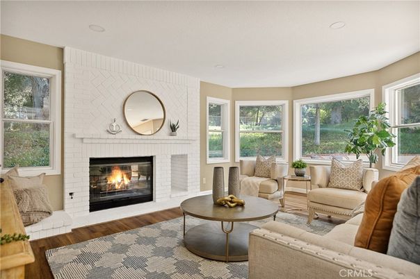 Fireplace, Interior, Living room, Recessed Lighting, Stone Walls, Wood Texture Flooring