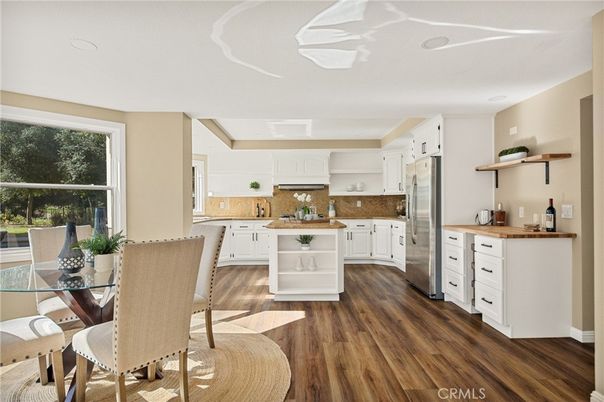 Dining room, Interior, Kitchen, Recessed Lighting, Stainless Steel Appliances, Wood Texture Flooring