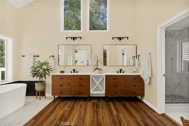 Bathroom, Dual Sink Vanities, Free Standing Baths, Interior, Marble, Marble Walls, Wood Texture Flooring