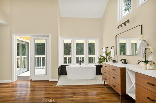 Bathroom, Dual Sink Vanities, Free Standing Baths, Interior, Marble, Wood Texture Flooring