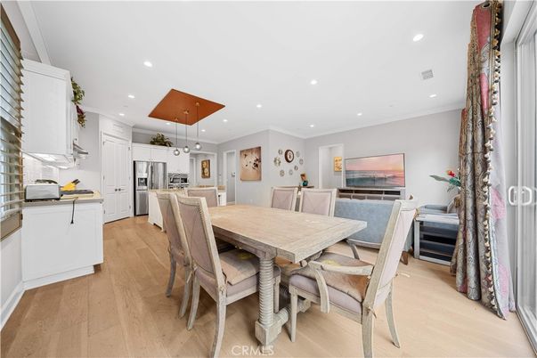 Dining room, Interior, Kitchen, Pendant Lights, Recessed Lighting, Stainless Steel Appliances, Wood Texture Flooring