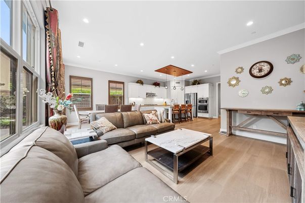 Dining room, Interior, Kitchen, Living room, Pendant Lights, Recessed Lighting, Stainless Steel Appliances, Wood Texture Flooring