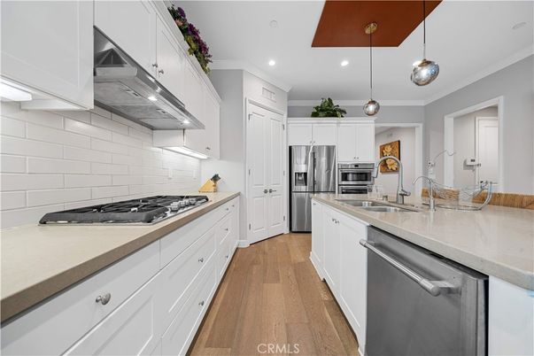 Interior, Kitchen, Pendant Lights, Recessed Lighting, Stainless Steel Appliances, Wood Texture Flooring