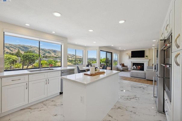 Dining room, Fireplace, Interior, Kitchen, Living room, Marble, Recessed Lighting, Stainless Steel Appliances