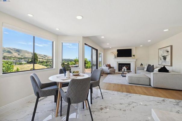 Dining room, Fireplace, Interior, Living room, Marble, Recessed Lighting, Wood Texture Flooring