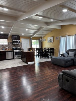 Chandelier, Dining room, Interior, Kitchen, Living room, Recessed Lighting, Stainless Steel Appliances, Wood Texture Flooring