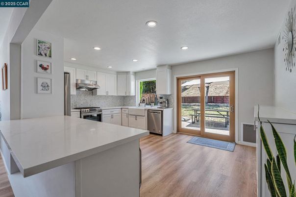 Interior, Kitchen, Recessed Lighting, Stainless Steel Appliances, Wood Texture Flooring