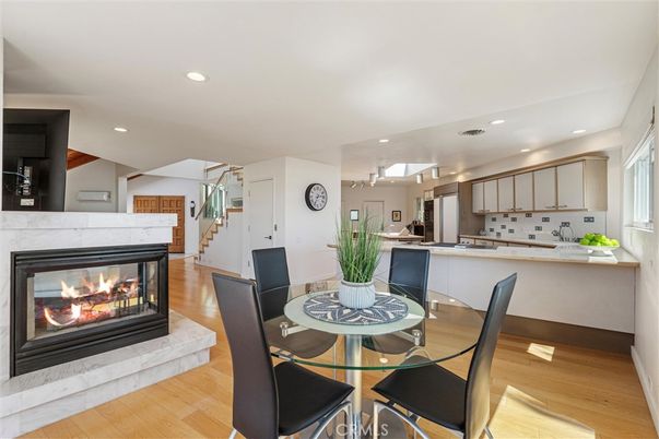 Dining room, Fireplace, Interior, Kitchen, Recessed Lighting, Wood Texture Flooring