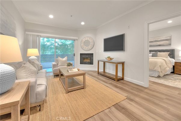 Bedroom, Fireplace, Interior, Living room, Recessed Lighting, Wood Texture Flooring