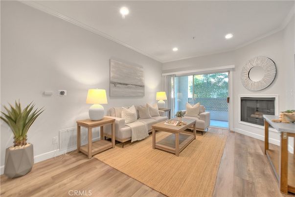 Fireplace, Interior, Living room, Recessed Lighting, Wood Texture Flooring