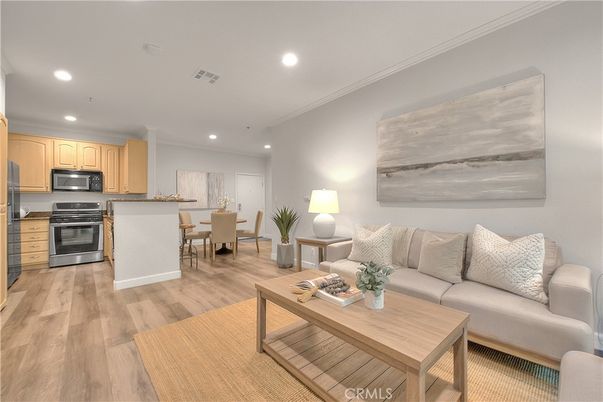 Dining room, Interior, Kitchen, Living room, Recessed Lighting, Stainless Steel Appliances, Wood Texture Flooring