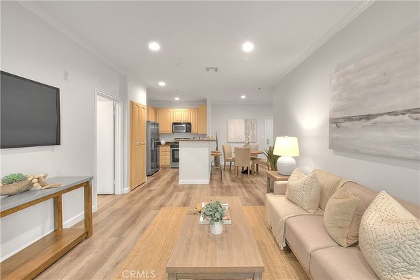 Dining room, Interior, Kitchen, Living room, Recessed Lighting, Stainless Steel Appliances, Wood Texture Flooring