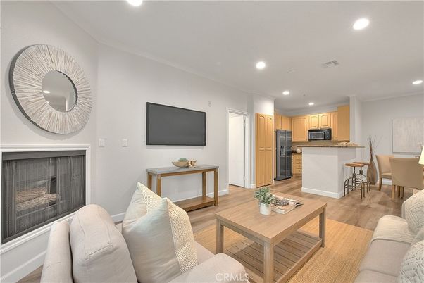 Dining room, Interior, Kitchen, Living room, Recessed Lighting, Stainless Steel Appliances, Wood Texture Flooring