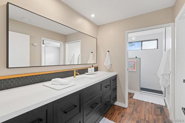 Bathroom, Dual Sink Vanities, Interior, Recessed Lighting, Wood Texture Flooring