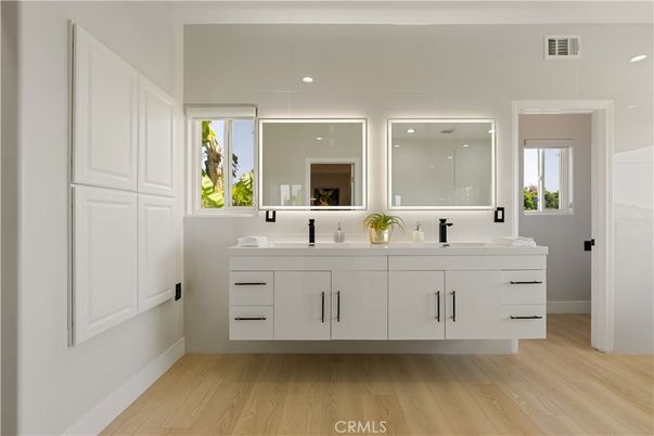 Bathroom, Dual Sink Vanities, Interior, Recessed Lighting, Wood Texture Flooring