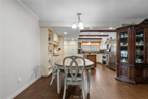 Dining room, Interior, Kitchen, Pendant Lights, Recessed Lighting, Stainless Steel Appliances, Wood Texture Flooring