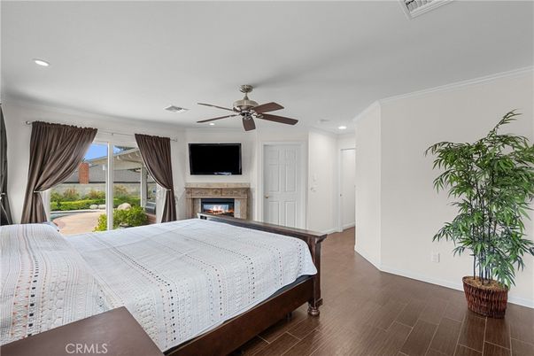 Bedroom, Fireplace, Interior, Recessed Lighting, Wood Texture Flooring