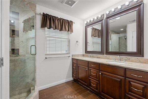 Bathroom, Dual Sink Vanities, Glass Shower, Interior, Wood Texture Flooring