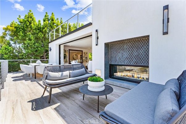 Exterior, Fireplace, Wood Texture Flooring