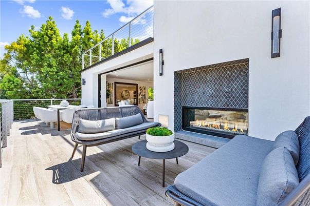 Exterior, Fireplace, Wood Texture Flooring