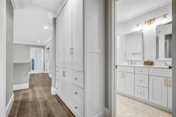 Bathroom, Dual Sink Vanities, Interior, Recessed Lighting, Wood Texture Flooring