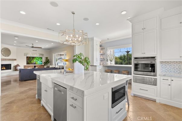 Fireplace, Interior, Kitchen, Living room, Pendant Lights, Recessed Lighting, Stainless Steel Appliances