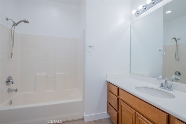 Bathroom, Dual Sink Vanities, Interior, Recessed Lighting, Wood Texture Flooring