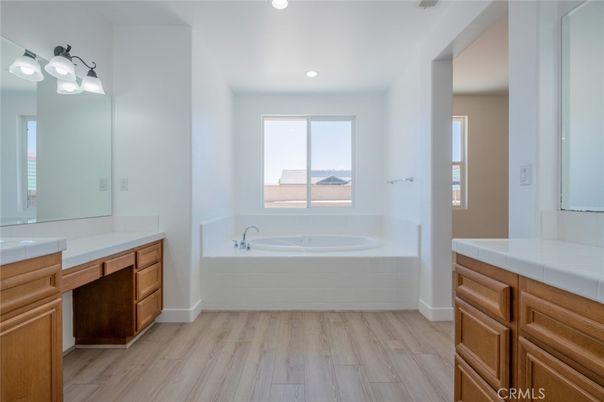 Bathroom, Interior, Recessed Lighting, Tile Countertops, Wood Texture Flooring