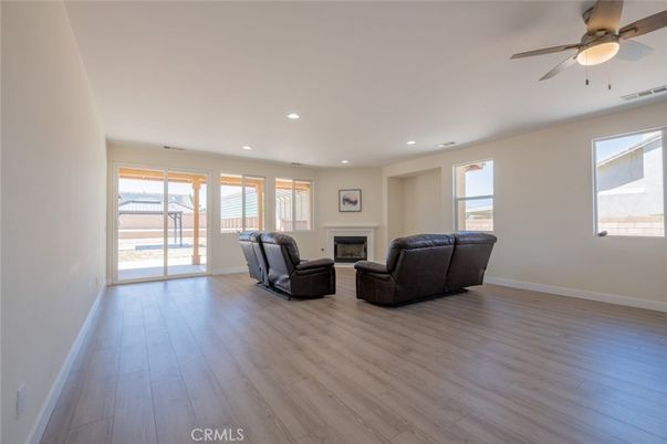 Empty room, Fireplace, Interior, Living room, Recessed Lighting, Wood Texture Flooring