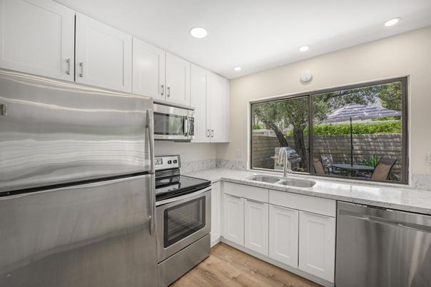 Interior, Kitchen, Recessed Lighting, Stainless Steel Appliances, Wood Texture Flooring