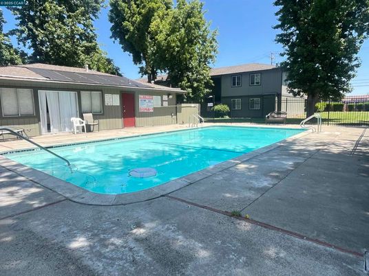 Exterior, Pool, Solar Panels