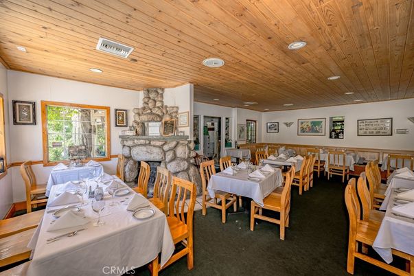 Dining room, Fireplace, Interior, Living room, Recessed Lighting, Wooden Ceilings