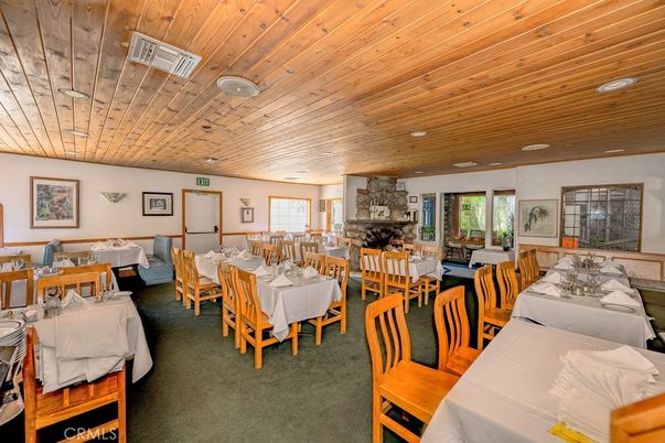 Dining room, Fireplace, Interior, Living room, Recessed Lighting, Wooden Ceilings
