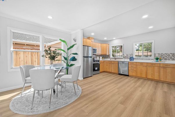 Dining room, Interior, Kitchen, Recessed Lighting, Stainless Steel Appliances, Wood Texture Flooring
