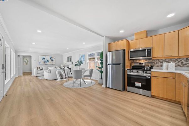 Dining room, Interior, Kitchen, Living room, Recessed Lighting, Stainless Steel Appliances, Wood Texture Flooring