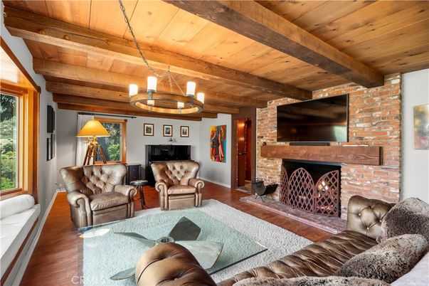Chandelier, Fireplace, Interior, Living room, Stone Walls, Wooden Beams, Wooden Ceilings, Wood Texture Flooring