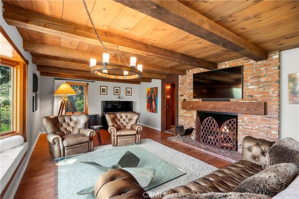 Chandelier, Fireplace, Interior, Living room, Stone Walls, Wooden Beams, Wooden Ceilings, Wood Texture Flooring