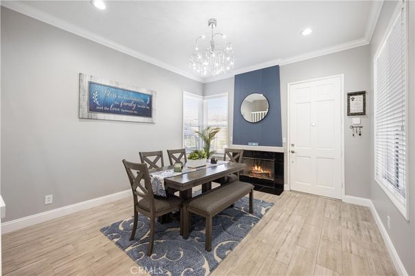 Dining room, Fireplace, Interior, Pendant Lights, Recessed Lighting, Wood Texture Flooring