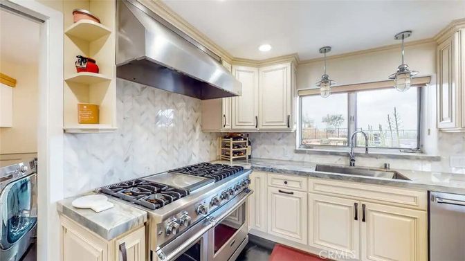 Interior, Kitchen, Marble Walls, Pendant Lights, Recessed Lighting, Stainless Steel Appliances