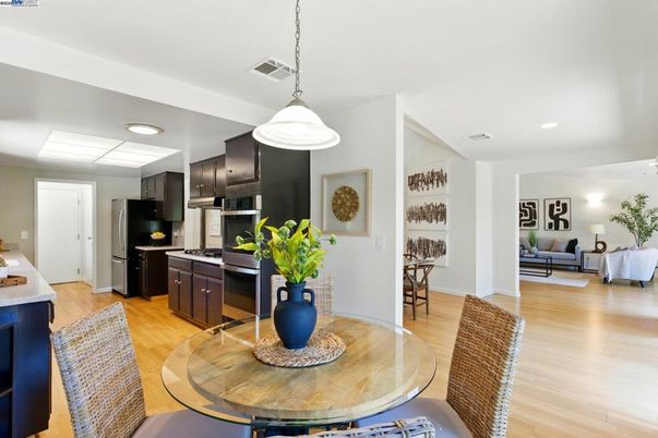 Dining room, Interior, Kitchen, Living room, Pendant Lights, Recessed Lighting, Stainless Steel Appliances, Wood Texture Flooring