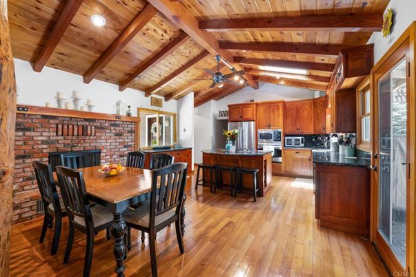 Dining room, Fireplace, Interior, Kitchen, Stainless Steel Appliances, Stone Walls, Wooden Beams, Wooden Ceilings, Wood Texture Flooring