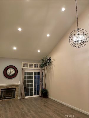Chandelier, Empty room, Fireplace, Interior, Recessed Lighting, Wood Texture Flooring