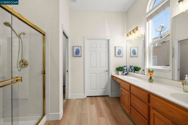 Bathroom, Dual Sink Vanities, Glass Shower, Interior, Wood Texture Flooring