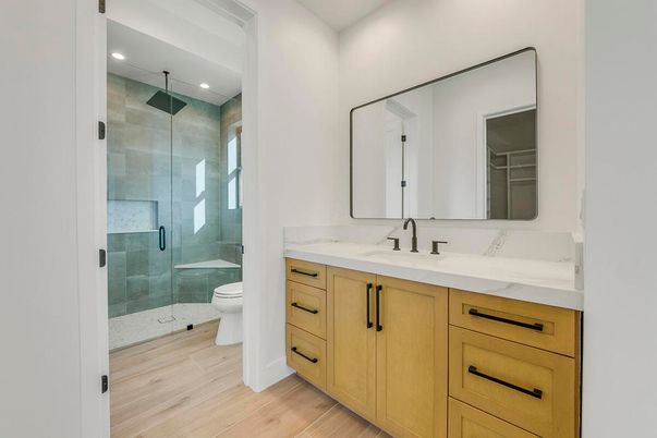 Bathroom, Dual Sink Vanities, Glass Shower, Interior, Recessed Lighting, Wood Texture Flooring