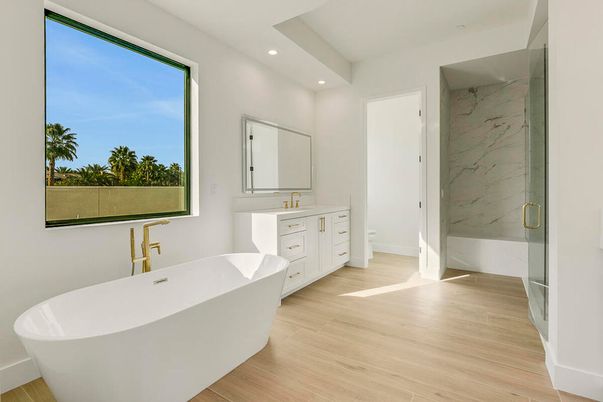Bathroom, Free Standing Baths, Interior, Marble Walls, Recessed Lighting, Wood Texture Flooring