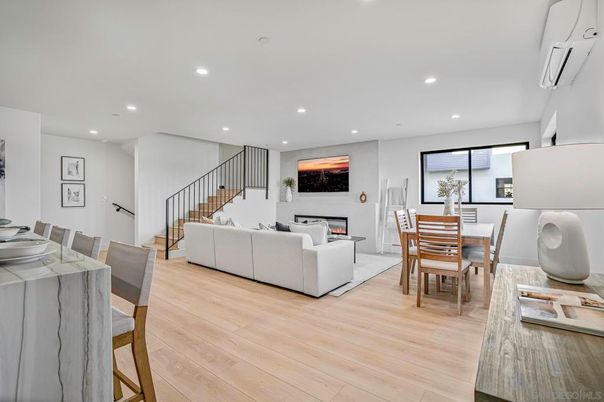 Dining room, Fireplace, Interior, Living room, Recessed Lighting, Wood Texture Flooring
